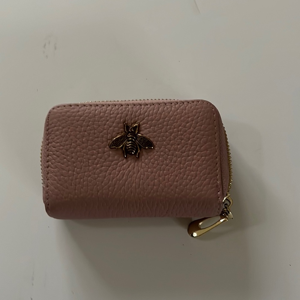 Small pink credit card wallet. Zipper close
